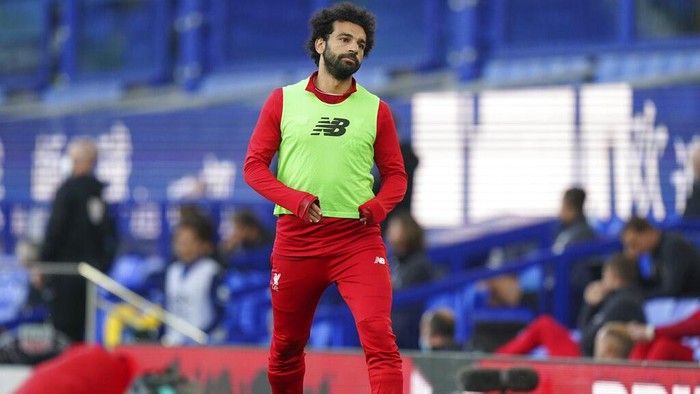 Liverpools Mohamed Salah warms-up during the English Premier League soccer match between Everton and Liverpool at Goodison Park in Liverpool, England, Sunday, June 21, 2020. (AP photo/Jon Super, Pool)
