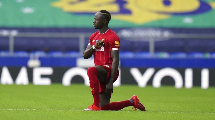 Sadio Mane Liverpools Sadio Mane takes the knee before the English Premier League soccer match between Everton and Liverpool at Goodison Park in Liverpool, England, Sunday, June 21, 2020. (AP photo/Jon Super, Pool)