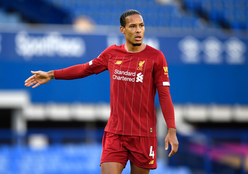 LIVERPOOL, ENGLAND - JUNE 21: Virgil van Dijk of Liverpool looks on during the Premier League match between Everton FC and Liverpool FC at Goodison Park on June 21, 2020 in Liverpool, England. Football Stadiums around Europe remain empty due to the Coronavirus Pandemic as Government social distancing laws prohibit fans inside venues resulting in all fixtures being played behind closed doors. (Photo by Peter Powell/Pool via Getty Images)