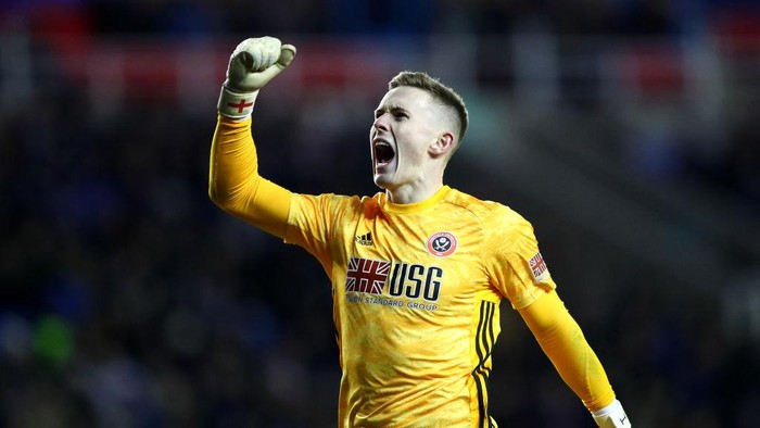 READING, ENGLAND - MARCH 03: Dean Henderson of Sheffield United celebrates his sides second goal scored by Billy Sharp (Not pictured) during the FA Cup Fifth Round match between Reading FC and Sheffield United at Madejski Stadium on March 03, 2020 in Reading, England. (Photo by Dan Istitene/Getty Images)