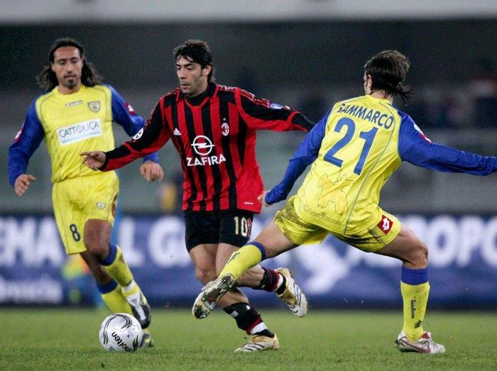 VERONA, ITALY - DECEMBER 3:  Manuel Rui Costa of Milan passes Paolo Sammarco of Chievo during the Serie A match between Chievo and AC Milan at the Marcantonio Bentegodi stadium on December 3, 2005 in Verona, Italy. (Photo by New Press/Getty Images)