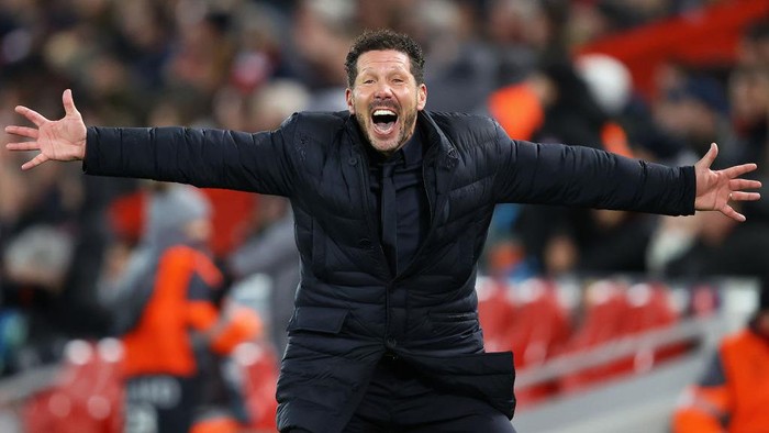 LIVERPOOL, ENGLAND - MARCH 11:  Diego Simeone, Manager of Atletico Madrid celebrates his sides second goal during the UEFA Champions League round of 16 second leg match between Liverpool FC and Atletico Madrid at Anfield on March 11, 2020 in Liverpool, United Kingdom. (Photo by Julian Finney/Getty Images)