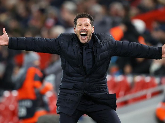 LIVERPOOL, ENGLAND - MARCH 11:  Diego Simeone, Manager of Atletico Madrid celebrates his sides second goal during the UEFA Champions League round of 16 second leg match between Liverpool FC and Atletico Madrid at Anfield on March 11, 2020 in Liverpool, United Kingdom. (Photo by Julian Finney/Getty Images)