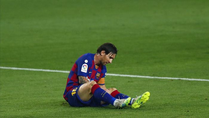 Lionel Messi Barcelonas Lionel Messi lies on the pitch during the Spanish La Liga soccer match between FC Barcelona and Athletic Bilbao at the Camp Nou stadium in Barcelona, Spain, Tuesday, June 23, 2020. (AP Photo/Joan Monfort)