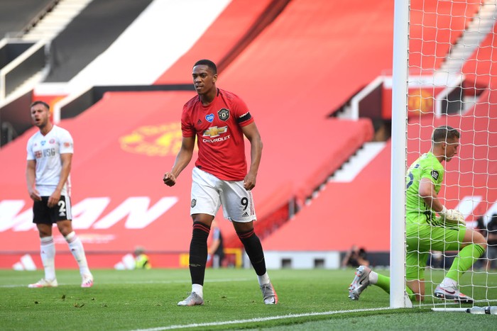 MANCHESTER, ENGLAND - JUNE 24: Anthony Martial of Manchester United celebrates after scoring his teams first goal during the Premier League match between Manchester United and Sheffield United at Old Trafford on June 24, 2020 in Manchester, England. (Photo by Michael Regan/Getty Images)