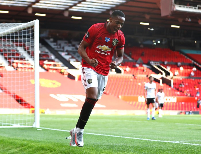 MANCHESTER, ENGLAND - JUNE 24: Anthony Martial of Manchester United celebrates after he scores his teams third goal during the Premier League match between Manchester United and Sheffield United at Old Trafford on June 24, 2020 in Manchester, England. (Photo by Michael Steele/Getty Images)