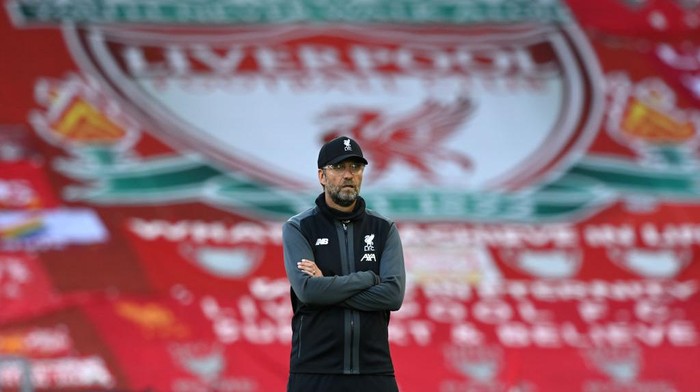 LIVERPOOL, ENGLAND - JUNE 24: Jurgen Klopp, Manager of Liverpool looks on as his team warm up ahead of the Premier League match between Liverpool FC and Crystal Palace at Anfield on June 24, 2020 in Liverpool, England. (Photo by Shaun Botterill/Getty Images)