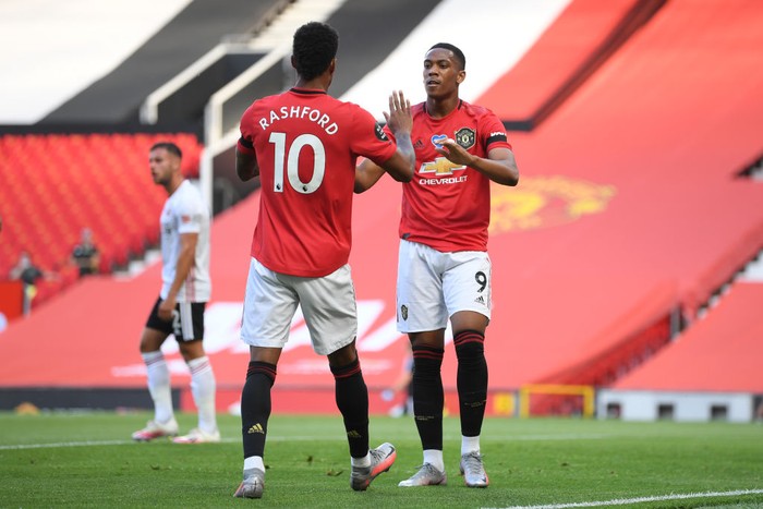 MANCHESTER, ENGLAND - JUNE 24: Anthony Martial of Manchester United celebrates with Marcus Rashford after scoring his teams first goal during the Premier League match between Manchester United and Sheffield United at Old Trafford on June 24, 2020 in Manchester, England. (Photo by Michael Regan/Getty Images)