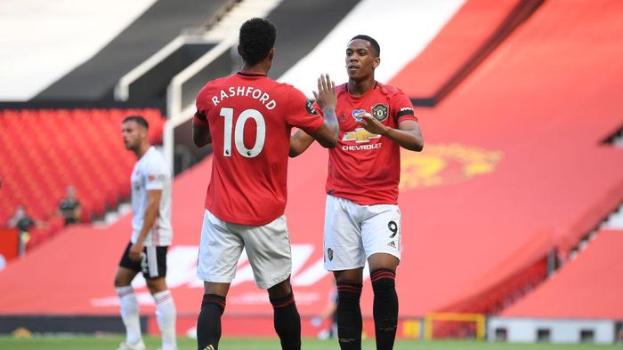Manchester United Vs Sheffield United MANCHESTER, ENGLAND - JUNE 24: Anthony Martial of Manchester United celebrates with Marcus Rashford after scoring his teams first goal during the Premier League match between Manchester United and Sheffield United at Old Trafford on June 24, 2020 in Manchester, England. (Photo by Michael Regan/Getty Images)