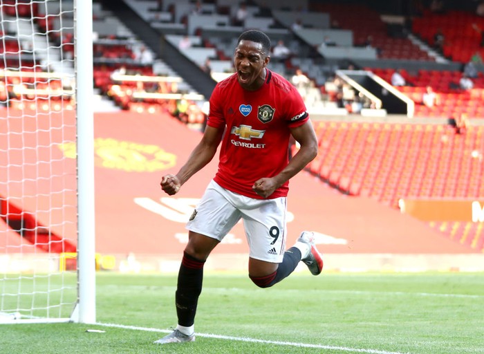 MANCHESTER, ENGLAND - JUNE 24: Anthony Martial of Manchester United celebrates after he scores his teams third goal during the Premier League match between Manchester United and Sheffield United at Old Trafford on June 24, 2020 in Manchester, England. (Photo by Michael Steele/Getty Images)