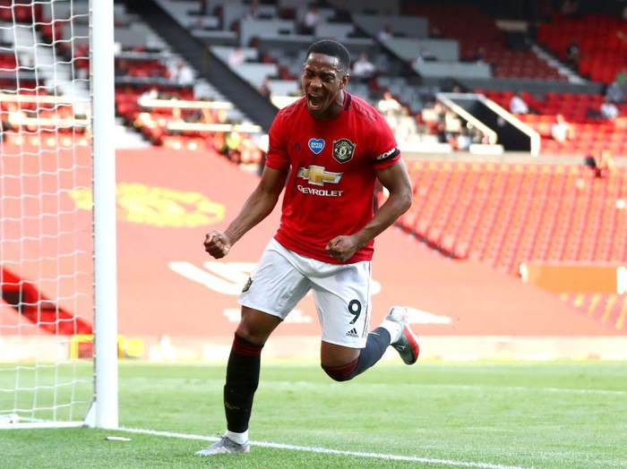 MANCHESTER, ENGLAND - JUNE 24: Anthony Martial of Manchester United celebrates after he scores his teams third goal during the Premier League match between Manchester United and Sheffield United at Old Trafford on June 24, 2020 in Manchester, England. (Photo by Michael Steele/Getty Images)