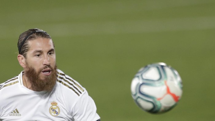 Real Madrids Sergio Ramos eyes the ball during the Spanish La Liga soccer match between Real Madrid and Mallorca at Alfredo di Stefano stadium in Madrid, Spain, Wednesday, June 24, 2020. (AP Photo/Bernat Armangue)