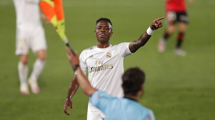 Real Madrids Vinicius Junior gestures during the Spanish La Liga soccer match between Real Madrid and Mallorca at Alfredo di Stefano stadium in Madrid, Spain, Wednesday, June 24, 2020. (AP Photo/Bernat Armangue)