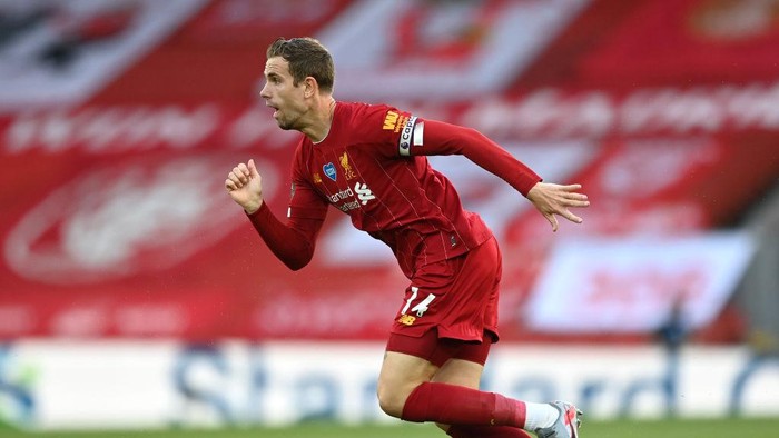 LIVERPOOL, ENGLAND - JUNE 24:  Jordan Henderson of Liverpool runs with the ball during the Premier League match between Liverpool FC and Crystal Palace at Anfield on June 24, 2020 in Liverpool, England. (Photo by Shaun Botterill/Getty Images)