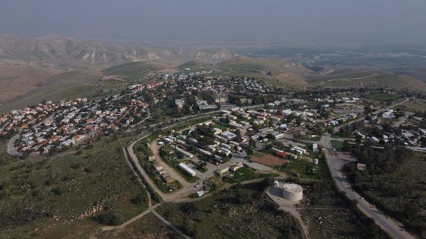 FILE - This Feb. 18, 2020 file photo, shows a view of the West Bank settlement of Ma'ale Efraim on the hills of the Jordan Valley. Israeli Prime Minister Benjamin Netanyahu has vowed to annex the valley and all of Israel's far-flung West Bank settlements, in line with President Donald Trump's Middle East plan, which overwhelmingly favors Israel and has been rejected by the Palestinians. (AP Photo/Ariel Schalit, File)