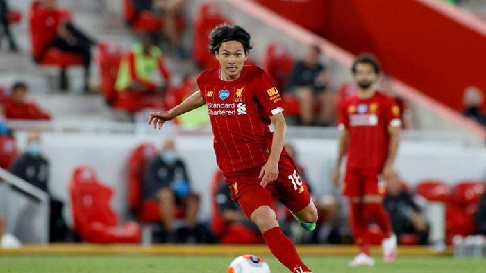 LIVERPOOL, ENGLAND - JUNE 24: Takumi Minamino of Liverpool in action during the Premier League match between Liverpool FC and Crystal Palace at Anfield on June 24, 2020 in Liverpool, England. (Phil Noble/Pool via Getty Images)