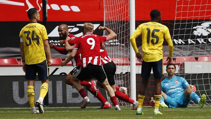 Arsenal Sheffield United SHEFFIELD, ENGLAND - JUNE 28: David McGoldrick of Sheffield United celebrates after he scores his teams first goal during the FA Cup Fifth Quarter Final match between Sheffield United and Arsenal FC at Bramall Lane on June 28, 2020 in Sheffield, England. (Photo by Andrew Boyers/Pool via Getty Images)