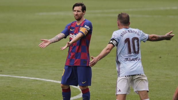 Barcelona's Lionel Messi gestures during a Spanish La Liga soccer match between RC Celta and Barcelona at the Balaidos stadium in Vigo, Spain, Saturday, June 27, 2020. (AP Photo/Lalo Villar)