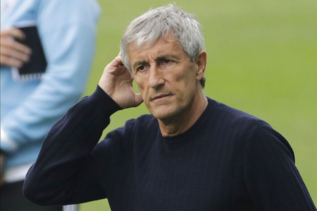 Barcelona's head coach Quique Setien gestures after the Spanish La Liga soccer match between RC Celta and Barcelona at the Balaidos stadium in Vigo, Spain, Saturday, June 27, 2020. (AP Photo/Lalo Villar)