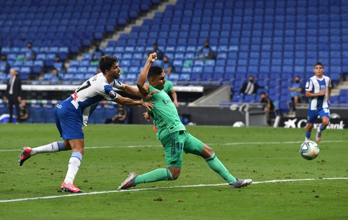 BARCELONA, SPAIN - JUNE 28: Casemiro of Real Madrid scores his sides first goal during the Liga match between RCD Espanyol and Real Madrid CF at RCDE Stadium on June 28, 2020 in Barcelona, Spain. (Photo by David Ramos/Getty Images)