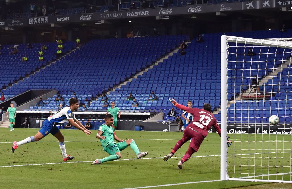 BARCELONA, SPAIN - JUNE 28: Casemiro of Real Madrid scores his sides first goal during the Liga match between RCD Espanyol and Real Madrid CF at RCDE Stadium on June 28, 2020 in Barcelona, Spain. (Photo by David Ramos/Getty Images)