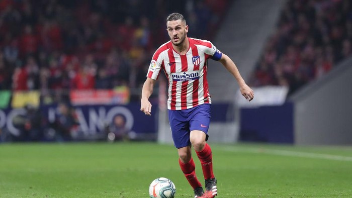 Koke MADRID, SPAIN - FEBRUARY 23: Koke of Atletico de Madrid controls the ball during the Liga match between Club Atletico de Madrid and Villarreal CF at Wanda Metropolitano on February 23, 2020 in Madrid, Spain. (Photo by Gonzalo Arroyo Moreno/Getty Images)