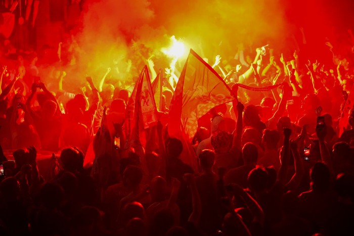 LIVERPOOL, ENGLAND - JUNE 25: Football fans celebrate at Anfield Stadium as Liverpool FC win the Premier League title after Chelsea beat Manchester City tonight ensuring Liverpool FC can no longer be overtaken on points on June 25, 2020 in Liverpool, England. Liverpool have won 18 league championships already with the last title win in 1989-90 under Kenny Dalglish. (Photo by Christopher Furlong/Getty Images)