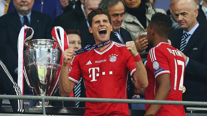 Mario Gomez LONDON, ENGLAND - MAY 25: Mario Gomez of Bayern Muenchen celebrates after victory in the UEFA Champions League final match between Borussia Dortmund and FC Bayern Muenchen at Wembley Stadium on May 25, 2013 in London, United Kingdom. (Photo by Alex Grimm/Getty Images)