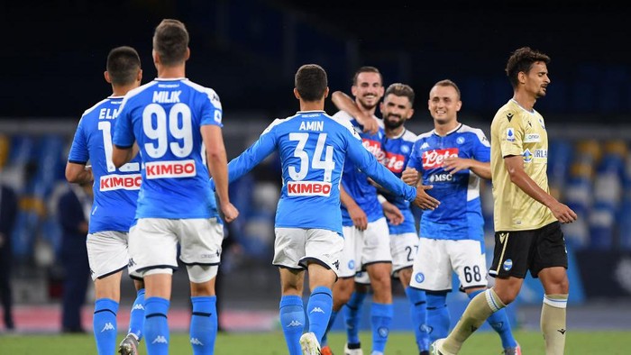 NAPLES, ITALY - JUNE 28: Amin Younes of SSC Napoli celebrates after scoring the 3-1 goal, beside the disappointment of Felipe of SPAL during the Serie A match between SSC Napoli and  SPAL at Stadio San Paolo on June 28, 2020 in Naples, Italy. (Photo by Francesco Pecoraro/Getty Images)