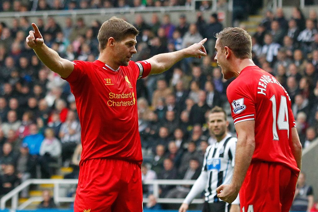 LIVERPOOL, ENGLAND - JANUARY 20:  Steven Gerrard of Liverpool hands the Captain's arm band over to Jordan Henderson of Liverpool during the Capital One Cup Semi-Final first leg match between Liverpool and Chelsea at Anfield on January 20, 2015 in Liverpool, England.  (Photo by Michael Regan/Getty Images)