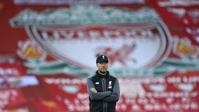 Liverpools manager Jurgen Klopp stands on the pitch before the English Premier League soccer match between Liverpool and Crystal Palace at Anfield Stadium in Liverpool, England, Wednesday, June 24, 2020. (Shaun Botterill/Pool via AP)