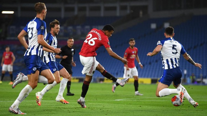 BRIGHTON, ENGLAND - JUNE 30: Mason Greenwood of Manchester United scores his sides first goal  during the Premier League match between Brighton & Hove Albion and Manchester United at American Express Community Stadium on June 30, 2020 in Brighton, United Kingdom. (Photo by Mike Hewitt/Getty Images)