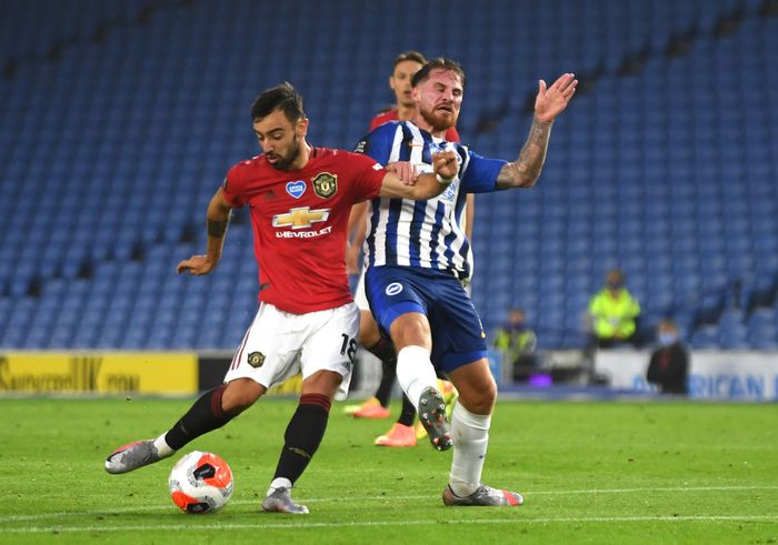 Bruno Fernandes BRIGHTON, ENGLAND - JUNE 30: Bruno Fernandes
of Manchester United scores his sides second goal during the Premier League match between Brighton & Hove Albion and Manchester United at American Express Community Stadium on June 30, 2020 in Brighton, United Kingdom. Football Stadiums around Europe remain empty due to the Coronavirus Pandemic as Government social distancing laws prohibit fans inside venues resulting in games being played behind closed doors. (Photo by Mike Hewitt/Getty Images)
