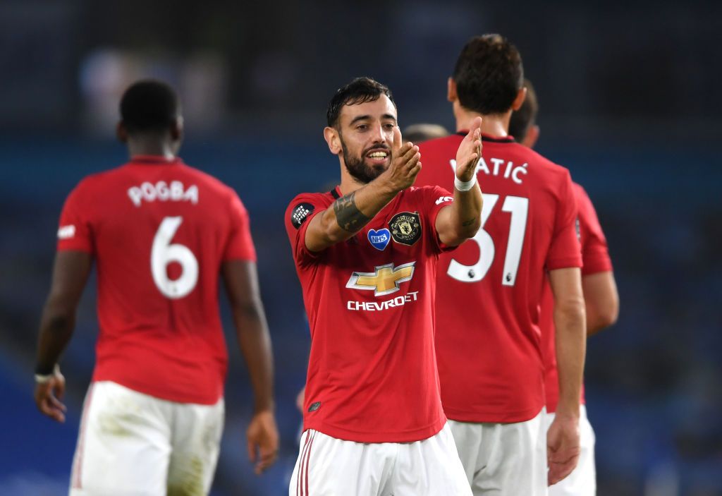 BRIGHTON, ENGLAND - JUNE 30: Bruno Fernandesof Manchester United scores his sides second goal during the Premier League match between Brighton & Hove Albion and Manchester United at American Express Community Stadium on June 30, 2020 in Brighton, United Kingdom. Football Stadiums around Europe remain empty due to the Coronavirus Pandemic as Government social distancing laws prohibit fans inside venues resulting in games being played behind closed doors. (Photo by Mike Hewitt/Getty Images)