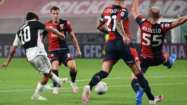 Juventus' Argentine forward Paulo Dybala (L) shoots to open the scoring during the Italian Serie A football match Genoa vs Juventus played on June 30, 2020 behind closed doors at the Luigi-Ferraris stadium in Genoa, as the country eases its lockdown aimed at curbing the spread of the COVID-19 infection, caused by the novel coronavirus. (Photo by Miguel MEDINA / AFP)