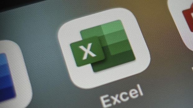 Italy, Rome - January 15 2020: The icon of the Excel app for iOS surrounded by some other office applications such as: Numbers (competitor app) and Power Point. Excel is part of office 365 suite.