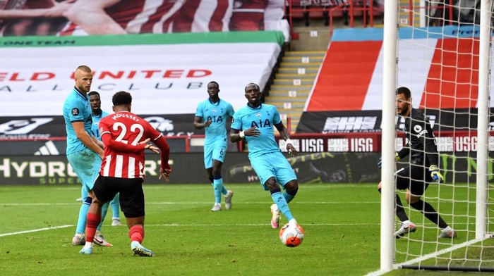 SHEFFIELD, ENGLAND - JULY 02: Lys Mousset of Sheffield United scores his teams second goal during the Premier League match between Sheffield United and Tottenham Hotspur at Bramall Lane on July 02, 2020 in Sheffield, England. Football Stadiums around Europe remain empty due to the Coronavirus Pandemic as Government social distancing laws prohibit fans inside venues resulting in all fixtures being played behind closed doors. (Photo by Oli Scarff/Pool via Getty Images)