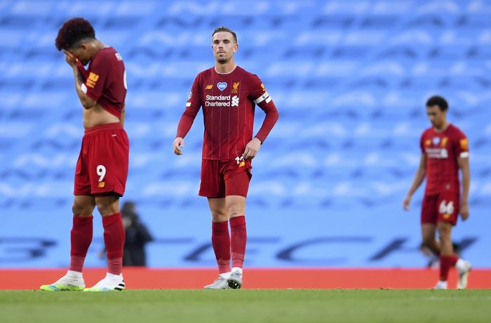 Henderson Liverpools Jordan Henderson, centre, reacts during the English Premier League soccer match between Manchester City and Liverpool at Etihad Stadium in Manchester, England, Thursday, July 2, 2020. (AP Photo/Laurence Griffiths,Pool)