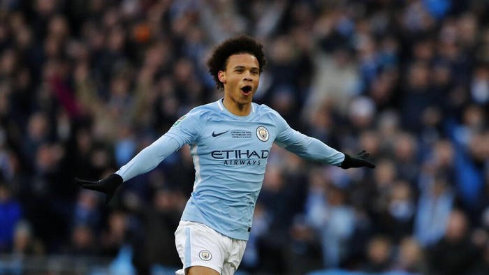 FILE-In this Feb. 25, 2018 file photo Manchester Citys Leroy Sane celebrates during the English League Cup final soccer match between Arsenal and Manchester City at Wembley Stadium in London. Leroy Sane moves from Manchester City to Bayern Munich. The 24-year-old signs a five-year contract in Munich. (AP Photo/Frank Augstein)