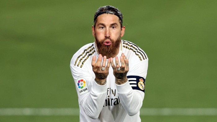 MADRID, SPAIN - JULY 02: Sergio Ramos of Real Madrid celebrates his teams first goal during the Liga match between Real Madrid CF and Getafe CF at Estadio Alfredo Di Stefano on July 02, 2020 in Madrid, Spain. Football Stadiums around Europe remain empty due to the Coronavirus Pandemic as Government social distancing laws prohibit fans inside venues resulting in all fixtures being played behind closed doors. (Photo by Angel Martinez/Getty Images)