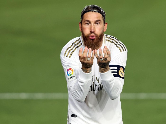 MADRID, SPAIN - JULY 02: Sergio Ramos of Real Madrid celebrates his team's first goal during the Liga match between Real Madrid CF and Getafe CF at Estadio Alfredo Di Stefano on July 02, 2020 in Madrid, Spain. Football Stadiums around Europe remain empty due to the Coronavirus Pandemic as Government social distancing laws prohibit fans inside venues resulting in all fixtures being played behind closed doors. (Photo by Angel Martinez/Getty Images)
