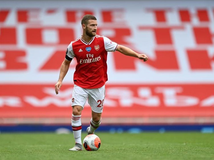 LONDON, ENGLAND - JULY 01: Shkodran Mustafi of Arsenal controls the ball during the Premier League match between Arsenal FC and Norwich City at Emirates Stadium on July 01, 2020 in London, England. Football Stadiums around Europe remain empty due to the Coronavirus Pandemic as Government social distancing laws prohibit fans inside venues resulting in all fixtures being played behind closed doors. (Photo by Shaun Botterill/Getty Images)