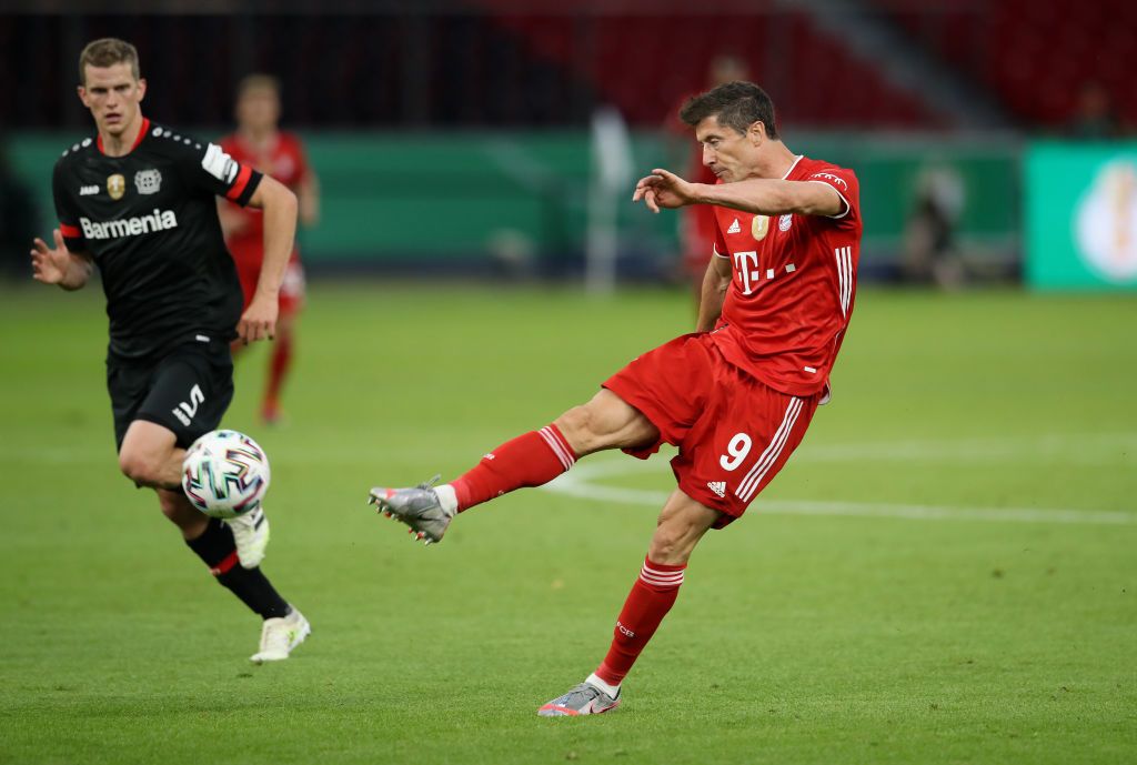 BERLIN, GERMANY - JULY 04: Robert Lewandowski of FC Bayern Muenchen scores his team's third goal during the DFB Cup final match between Bayer 04 Leverkusen and FC Bayern Muenchen at Olympiastadion on July 04, 2020 in Berlin, Germany. (Photo by Alexander Hassenstein/Getty Images)