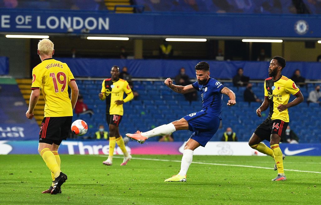 LONDON, ENGLAND - JULY 04: Olivier Giroud of Chelsea shoots during the Premier League match between Chelsea FC and Watford FC at Stamford Bridge on July 04, 2020 in London, England. Football Stadiums around Europe remain empty due to the Coronavirus Pandemic as Government social distancing laws prohibit fans inside venues resulting in all fixtures being played behind closed doors. (Photo by Glyn Kirk/Pool via Getty Images)