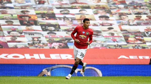 Manchester United's Mason Greenwood celebrates his goal during the English Premier League soccer match between Manchester United and Bournemouth at Old Trafford stadium in Manchester, England, Saturday, July 4, 2020. (Peter Powell/Pool via AP)
