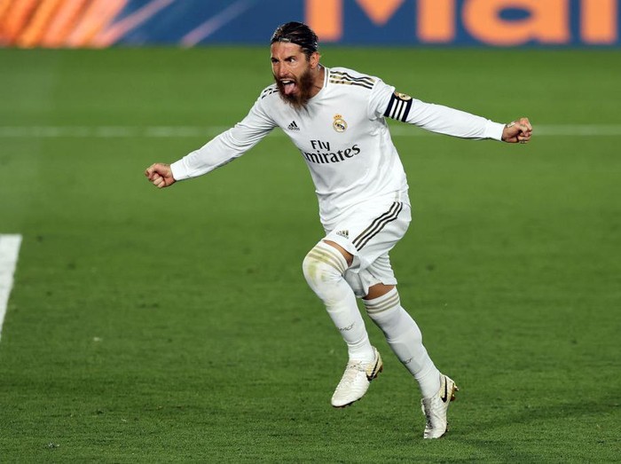 BILBAO, SPAIN - JULY 05: Sergio Ramos of Real Madrid scores a penalty for his team's first goal during the La Liga match between Athletic Club and Real Madrid CF at San Mames Stadium on July 05, 2020 in Bilbao, Spain. Football Stadiums around Europe remain empty due to the Coronavirus Pandemic as Government social distancing laws prohibit fans inside venues resulting in all fixtures being played behind closed doors. (Photo by Juan Manuel Serrano Arce/Getty Images)