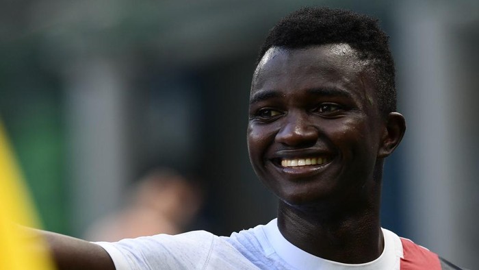 Bolognas Gambian midfielder Musa Juwara smiles after winning the Italian Serie A football match between Inter Milan and Bologna played behind closed doors on July 5, 2020 at the Giuseppe-Meazza San Siro stadium in Milan. (Photo by MIGUEL MEDINA / AFP)