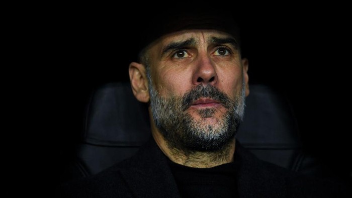 MADRID, SPAIN - FEBRUARY 26: Josep Guardiola, manager of Manchester City FC looks on during the UEFA Champions League round of 16 first leg match between Real Madrid and Manchester City at Bernabeu on February 26, 2020 in Madrid, Spain. (Photo by David Ramos/Getty Images)