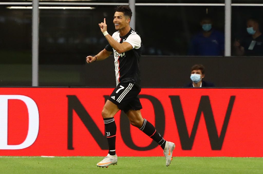 MILAN, ITALY - JULY 07:  Cristiano Ronaldo #7 of Juventus FC celebrates his goal during the Serie A match between AC Milan and Juventus at Stadio Giuseppe Meazza on July 7, 2020 in Milan, Italy.  (Photo by Marco Luzzani/Getty Images)