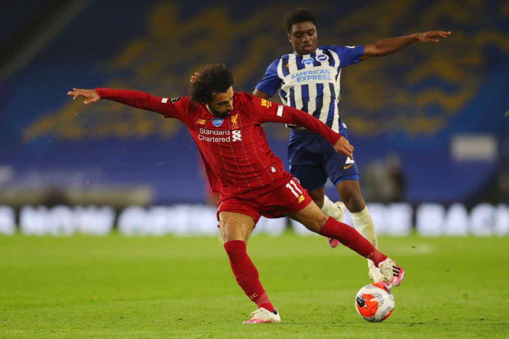 BRIGHTON, ENGLAND - JULY 08: Mohamed Salah of Liverpool reacts during the Premier League match between Brighton & Hove Albion and Liverpool FC at American Express Community Stadium on July 08, 2020 in Brighton, England. Football Stadiums around Europe remain empty due to the Coronavirus Pandemic as Government social distancing laws prohibit fans inside venues resulting in all fixtures being played behind closed doors. (Photo by Paul Childs/Pool via Getty Images)